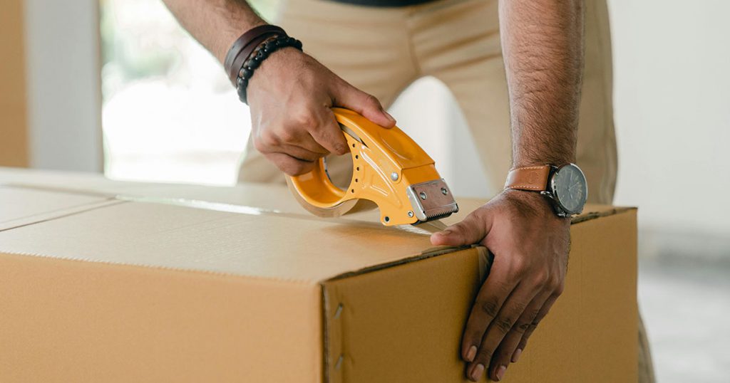 taping up a moving box