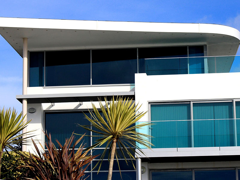 Small modern condo with palm trees
